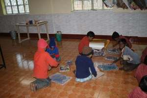 Class 3 boys busy painting